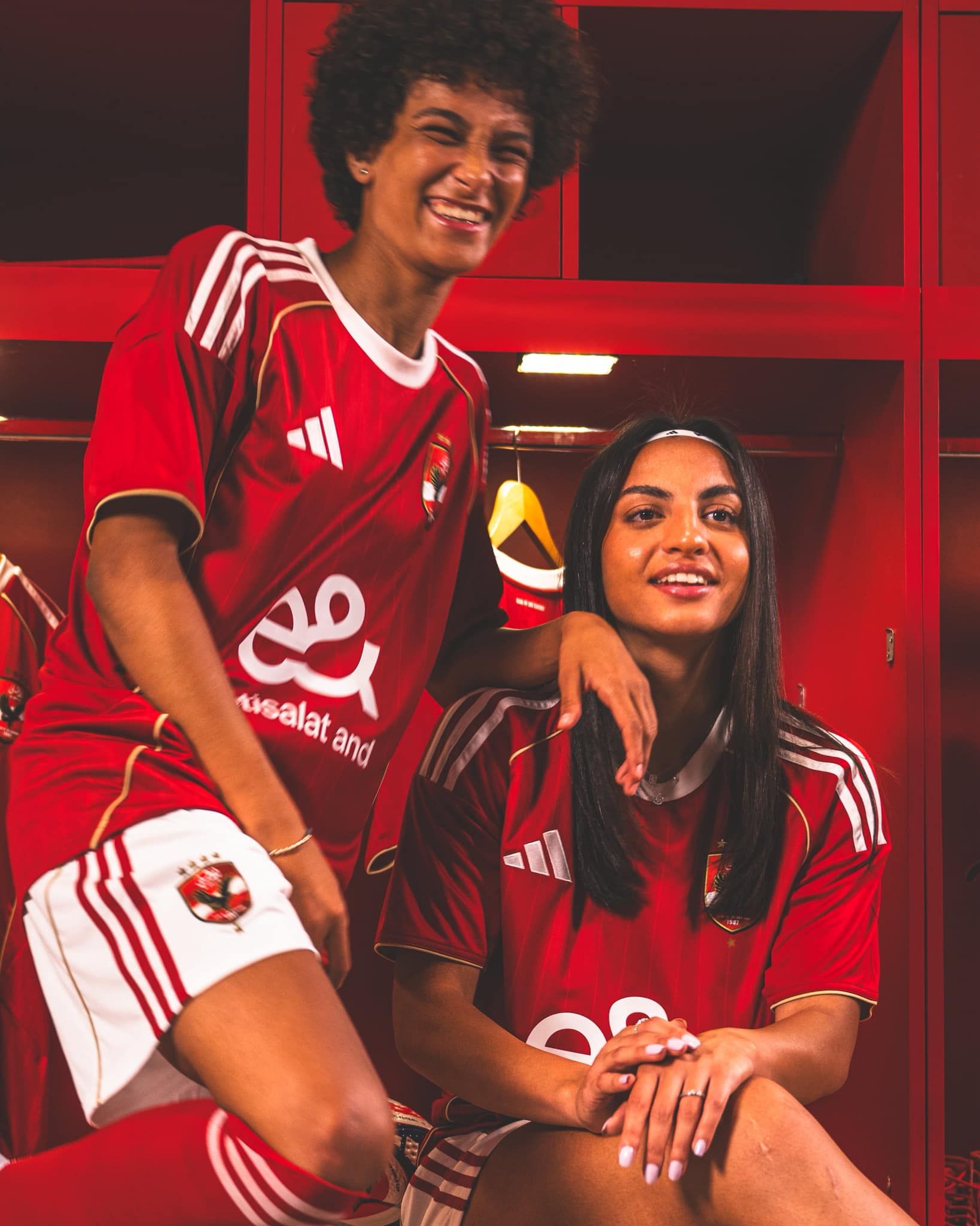 May be an image of 2 people, people playing football, people playing soccer and text