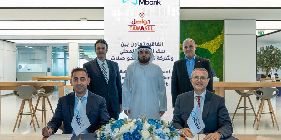 إطلاق أول عملية دفع رقمية باستخدام عملة AE Coin في مركبات الأجرة بأبوظبي